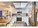 Spacious kitchen with stainless steel appliances and a breakfast bar at 5706 W Lake Mead Blvd, Las Vegas, NV 89108