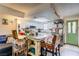 Open floor plan with a large kitchen island and stainless steel appliances at 5706 W Lake Mead Blvd, Las Vegas, NV 89108