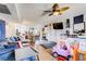Open-concept living room flowing into the kitchen with hardwood floors at 5706 W Lake Mead Blvd, Las Vegas, NV 89108