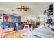 Open-concept living room flowing into the kitchen with hardwood floors at 5706 W Lake Mead Blvd, Las Vegas, NV 89108