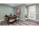 Cozy dining area featuring a wood table, comfortable seating, and stylish decor at 600 N Carriage Hill Dr # 1081, Las Vegas, NV 89138