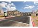 Gated community entrance with signage and well-maintained landscaping at 600 N Carriage Hill Dr # 1081, Las Vegas, NV 89138