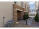 Inviting exterior showcases a modern design with stone accents and neutral tones at 600 N Carriage Hill Dr # 1081, Las Vegas, NV 89138