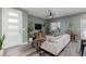 Inviting living room with modern decor, ceiling fan, and wood-look flooring at 600 N Carriage Hill Dr # 1081, Las Vegas, NV 89138