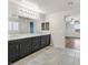Bathroom with dual vanities, and tile floors at 6110 Scarlet Leaf St, Las Vegas, NV 89148
