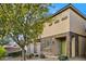 Charming home featuring stone accents, a green door, and a well maintained landscape at 6110 Scarlet Leaf St, Las Vegas, NV 89148