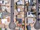 Aerial view showing houses near a cul-de-sac, some with solar panels, pools, and desert landscaping at 6117 Borden Cir, Las Vegas, NV 89107