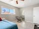 Bedroom with a window, sliding closet doors, and tile floors at 6117 Borden Cir, Las Vegas, NV 89107