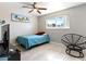 Bedroom with a window, tiled floors, and modern furnishings at 6117 Borden Cir, Las Vegas, NV 89107