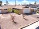 Aerial view of a single-story home with a desert-landscaped yard and a two-car garage at 6117 Borden Cir, Las Vegas, NV 89107