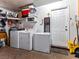 Laundry area with a washer, dryer and chest freezer, with access to the exterior at 6117 Borden Cir, Las Vegas, NV 89107