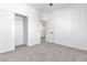 Cozy bedroom with carpeted floors, closet and view of the hallway at 6329 Sandy Ridge St # 1, North Las Vegas, NV 89081