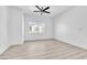 Bedroom with light colored vinyl floor, ceiling fan, and window at 6329 Sandy Ridge St # 1, North Las Vegas, NV 89081