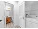 Laundry room with modern appliances and neutral walls at 6329 Sandy Ridge St # 1, North Las Vegas, NV 89081