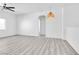 Modern living room featuring neutral walls and laminate flooring at 6329 Sandy Ridge St # 1, North Las Vegas, NV 89081
