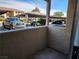 View from a balcony of a parking lot and other buildings at 7200 Pirates Cove Rd # 1014, Las Vegas, NV 89145