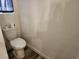 Bathroom featuring a standard toilet and wood-style flooring at 7200 Pirates Cove Rd # 1014, Las Vegas, NV 89145