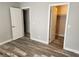 Bedroom with two doors leading to a closet and bathroom at 7200 Pirates Cove Rd # 1014, Las Vegas, NV 89145