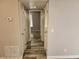 Hallway featuring a closet and views of bedrooms at 7200 Pirates Cove Rd # 1014, Las Vegas, NV 89145