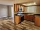 Open-concept kitchen with stainless steel appliances seamlessly blends into living space at 7200 Pirates Cove Rd # 1014, Las Vegas, NV 89145
