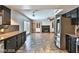 Kitchen leading to the living room with a fireplace at 722 Barrie Ct, Henderson, NV 89002