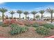 Community entrance with lush desert landscaping and prominent signage at Galaxy Park under a clear blue sky at 7456 Cooks Meadow St, North Las Vegas, NV 89084