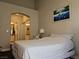 A serene bedroom with an en-suite bathroom, light walls, and a relaxing atmosphere for rest at 75 N Valle Verde Dr # 1822, Henderson, NV 89074