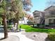 Manicured community greenspace with picnic area, mature trees, and pet station at 75 N Valle Verde Dr # 1822, Henderson, NV 89074