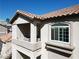 This condo features a private balcony, terracotta roof, and decorative trim at 75 N Valle Verde Dr # 1822, Henderson, NV 89074