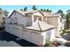 Inviting condo with tile roof and attached three-car garage in a desirable location at 75 N Valle Verde Dr # 1822, Henderson, NV 89074
