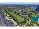 Scenic aerial view of the community with golf course, lush landscaping, and surrounding city skyline at 778 Oakmont Ave # 312, Las Vegas, NV 89109