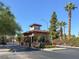 The guard house has a stone exterior, offering a secure and private entrance to the neighborhood at 778 Oakmont Ave # 312, Las Vegas, NV 89109