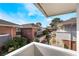 Balcony view overlooking the surrounding neighborhood with lush greenery and clear blue skies at 778 Oakmont Ave # 312, Las Vegas, NV 89109