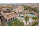 Expansive backyard featuring a pool, sport court, and lush landscaping in a desirable neighborhood at 7825 Alameda Creek St, Las Vegas, NV 89113