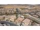 An aerial view of a neighborhood featuring single-Gathering homes with desert landscaping at 7825 Alameda Creek St, Las Vegas, NV 89113