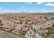 Panoramic neighborhood home featuring a sparkling pool and spa, with manicured landscaping at 7825 Alameda Creek St, Las Vegas, NV 89113