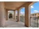This outdoor balcony features decorative columns and wrought iron railings at 7825 Alameda Creek St, Las Vegas, NV 89113