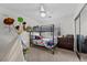 This charming bedroom features a cozy bunk bed and playful decor at 7825 Alameda Creek St, Las Vegas, NV 89113