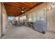 Covered patio with ceiling fan, TV, and outdoor dining area at 7825 Alameda Creek St, Las Vegas, NV 89113