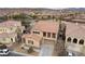 Stunning two-story home with well-manicured landscaping, a balcony, and a spacious two car garage at 7825 Alameda Creek St, Las Vegas, NV 89113