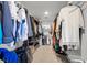 Spacious walk-in closet with custom shelving and ample storage for clothes and accessories at 7825 Alameda Creek St, Las Vegas, NV 89113