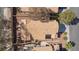 Overhead view of a home with a tile roof, landscaped yard, and a private driveway at 92 Sea Holly Way, Henderson, NV 89074