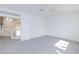 Carpeted bedroom featuring a ceiling fan, a loft view, and plenty of natural light at 92 Sea Holly Way, Henderson, NV 89074