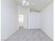 This bedroom offers a neutral color scheme, closet space, plush carpet, and bright natural light at 92 Sea Holly Way, Henderson, NV 89074