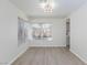 Dining room with light hardwood floors and bright natural lighting at 92 Sea Holly Way, Henderson, NV 89074