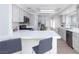 Bright kitchen featuring a stainless steel refrigerator and range at 92 Sea Holly Way, Henderson, NV 89074