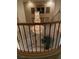Grand foyer showcases soaring ceilings, a sparkling chandelier, and an elegant staircase at 9301 Harrow Rock St, Las Vegas, NV 89143