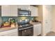 Modern kitchen featuring stainless steel appliances, sleek countertops, and ample cabinet space at 9451 Calm Stream Ave # Lot 81, Las Vegas, NV 89178