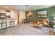 Inviting living area with open floor plan, featuring sleek flooring and stylish furnishings at 9451 Calm Stream Ave # Lot 81, Las Vegas, NV 89178