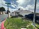 Single-story home with a well-maintained front yard and a two-car garage at , Las Vegas, NV 89106